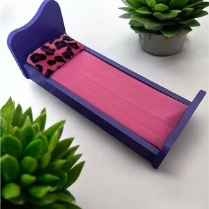 Purple and Pink Doll Bed